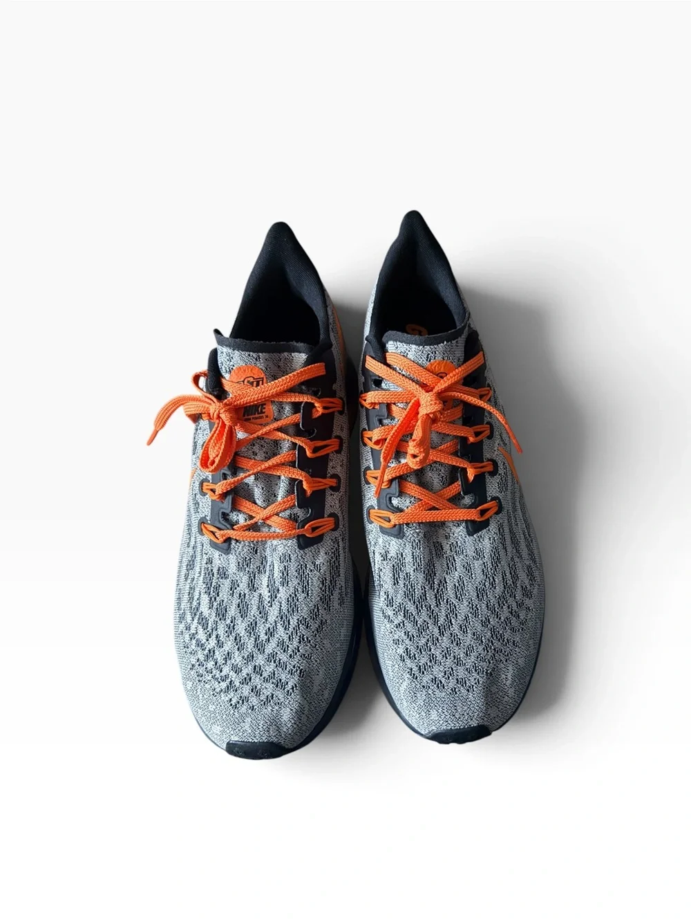 Nike Men’s Gray Running Sneakers with Orange Accents